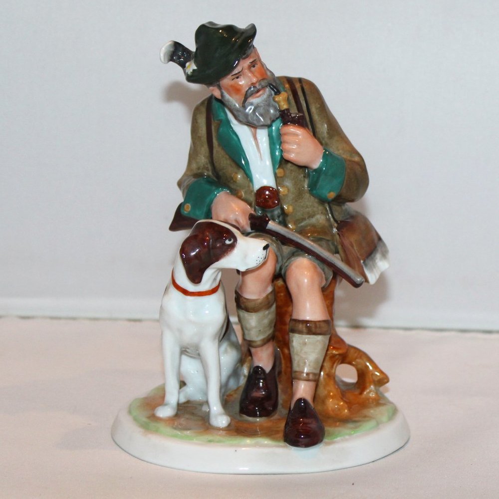 vintage Fasold & Stauch porcelain figurine of hunter smoking pipe with dog 17415